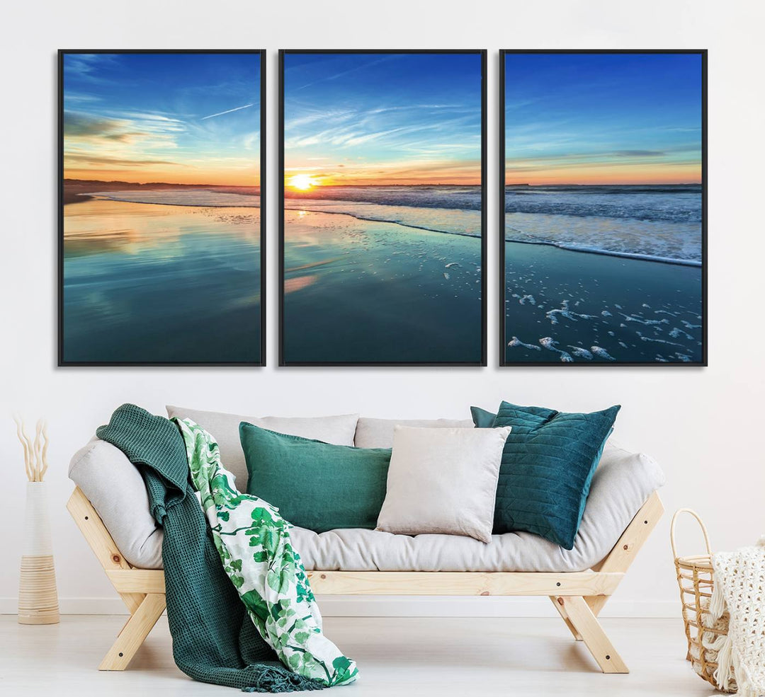 The Blue Sky and Beach Wall Art Canvas Print features a vibrant orange sky reflecting on wet sand.