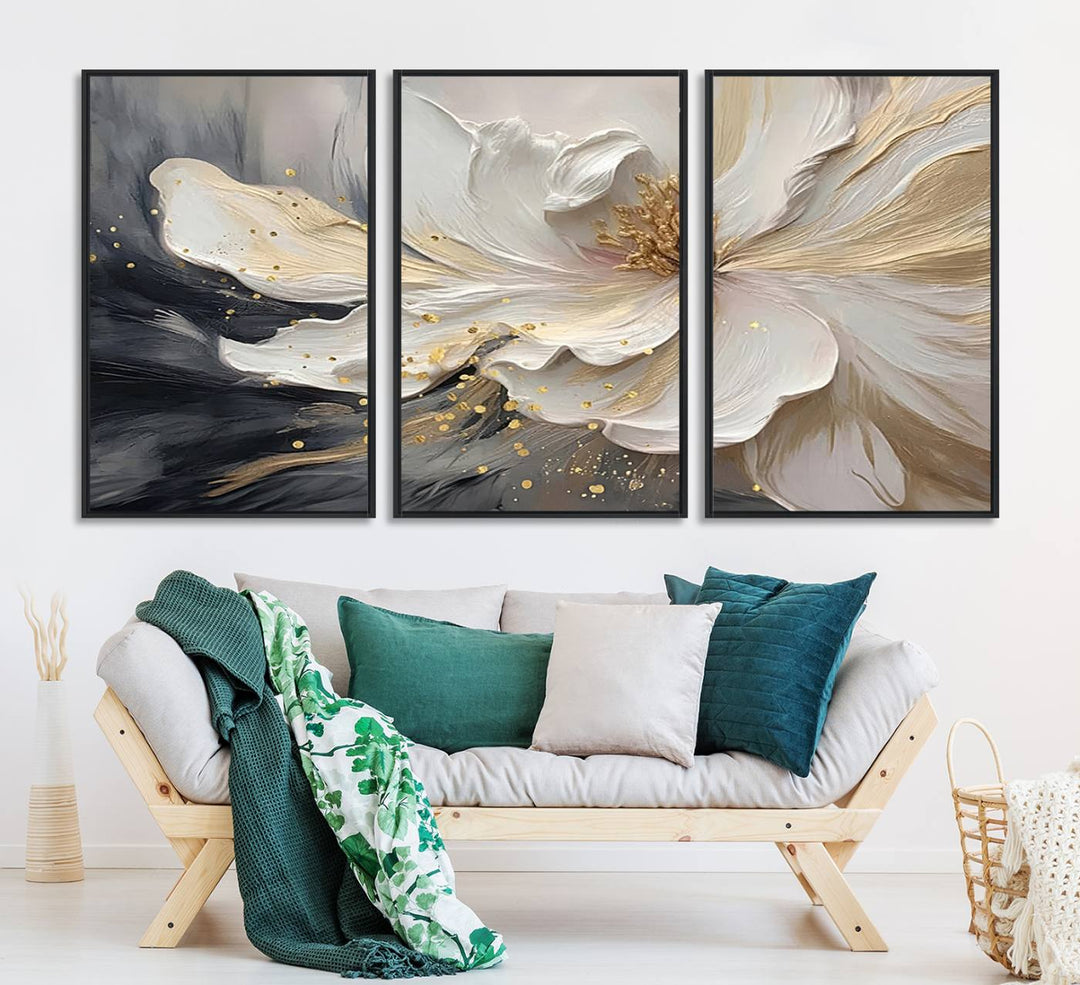 Elegant White and Gold Floral Triptych Canvas Art, a modern textured flower painting for home or office decor, features a blurred gray background.