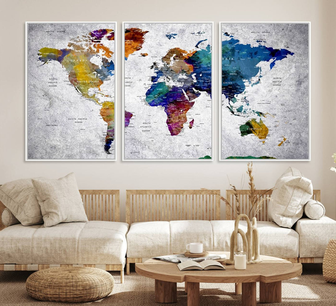 The World Map Art Canvas Print, featuring country names on a grunge-stained gray background, is perfect for stylish home decor.