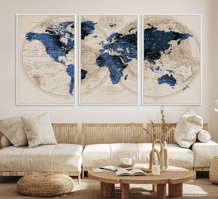 The Vintage Triptych Map Print is a grunge-stained blue and beige world map, perfect for enhancing wall decor.