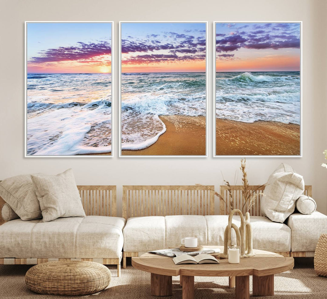 The Coastal Sunset Art Canvas Print features ocean waves beneath a vibrant sky in a stunning 3-panel seascape.