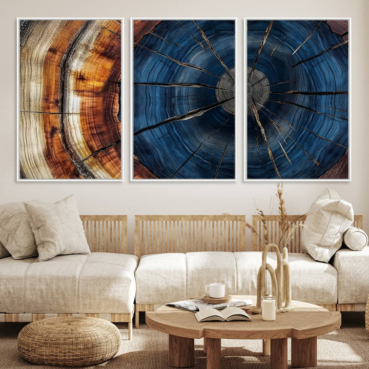 The Abstract Tree Rings Canvas Print features blue, brown, and orange rings that highlight wood grain and natures beauty.