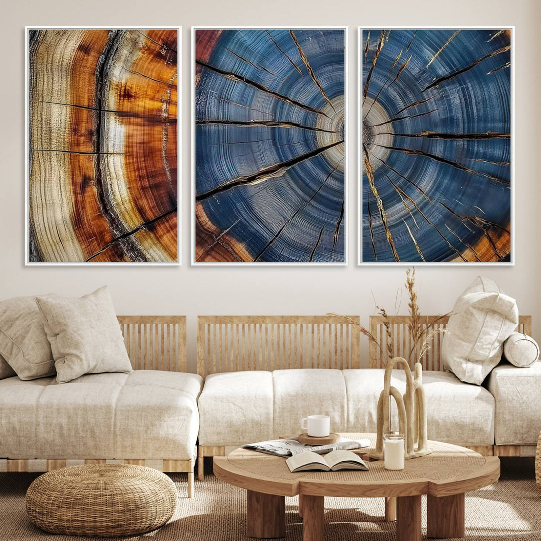 Close-up of blue, brown, and orange wood grain rings on the Abstract Tree Rings Canvas Wall Art Print.