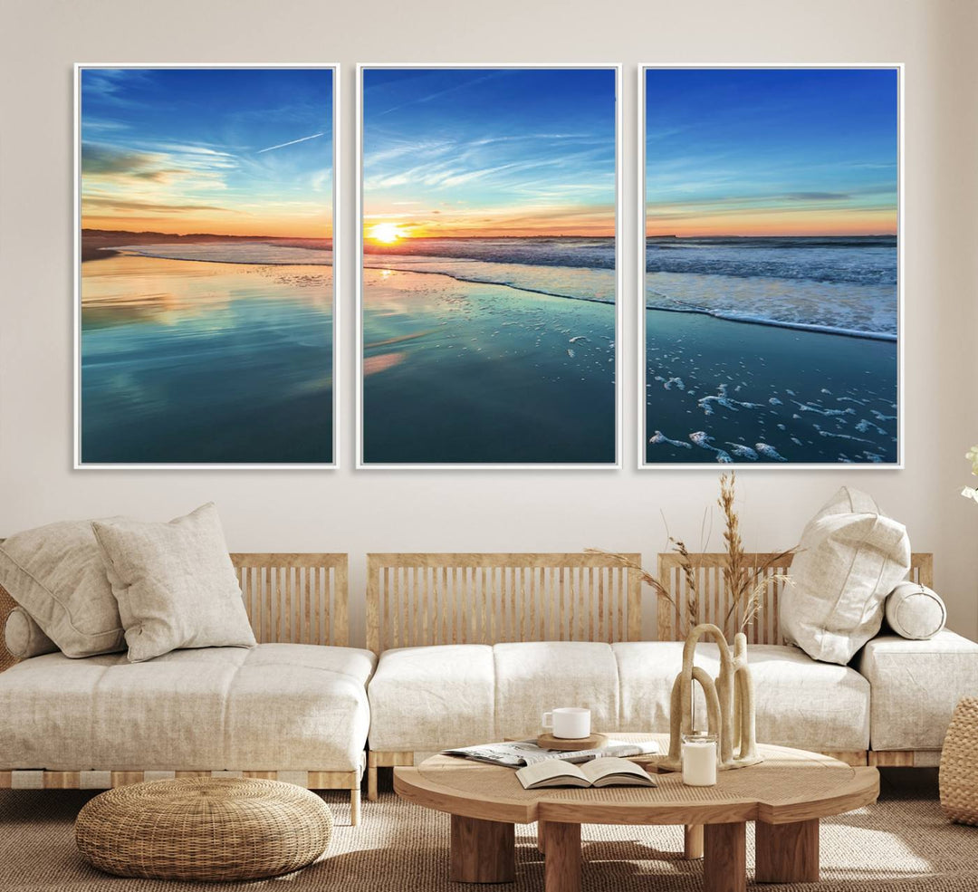 The Blue Sky and Beach Wall Art Canvas Print features a vibrant orange sky reflecting on wet sand.