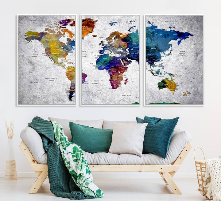 The World Map Art Canvas Print, featuring country names on a grunge-stained gray background, is perfect for stylish home decor.