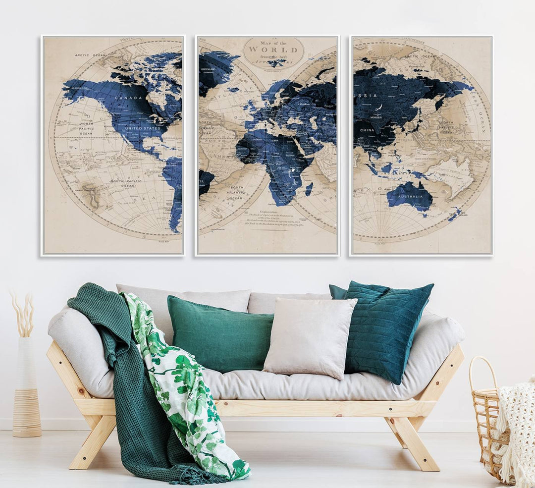 The Vintage Triptych Map Print is a grunge-stained blue and beige world map, perfect for enhancing wall decor.