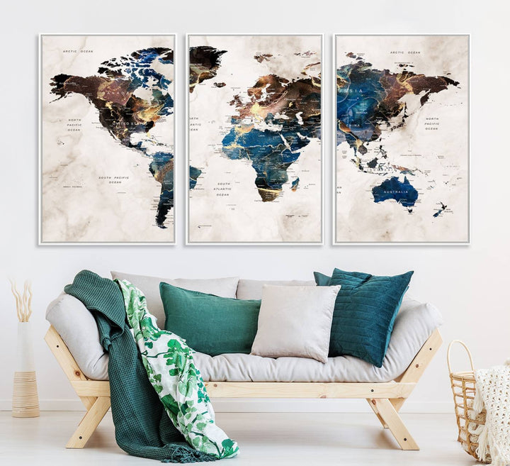 Abstract earth-toned 3-panel world map wall art featuring blues and browns, ready to hang; it showcases continents on modern canvas.