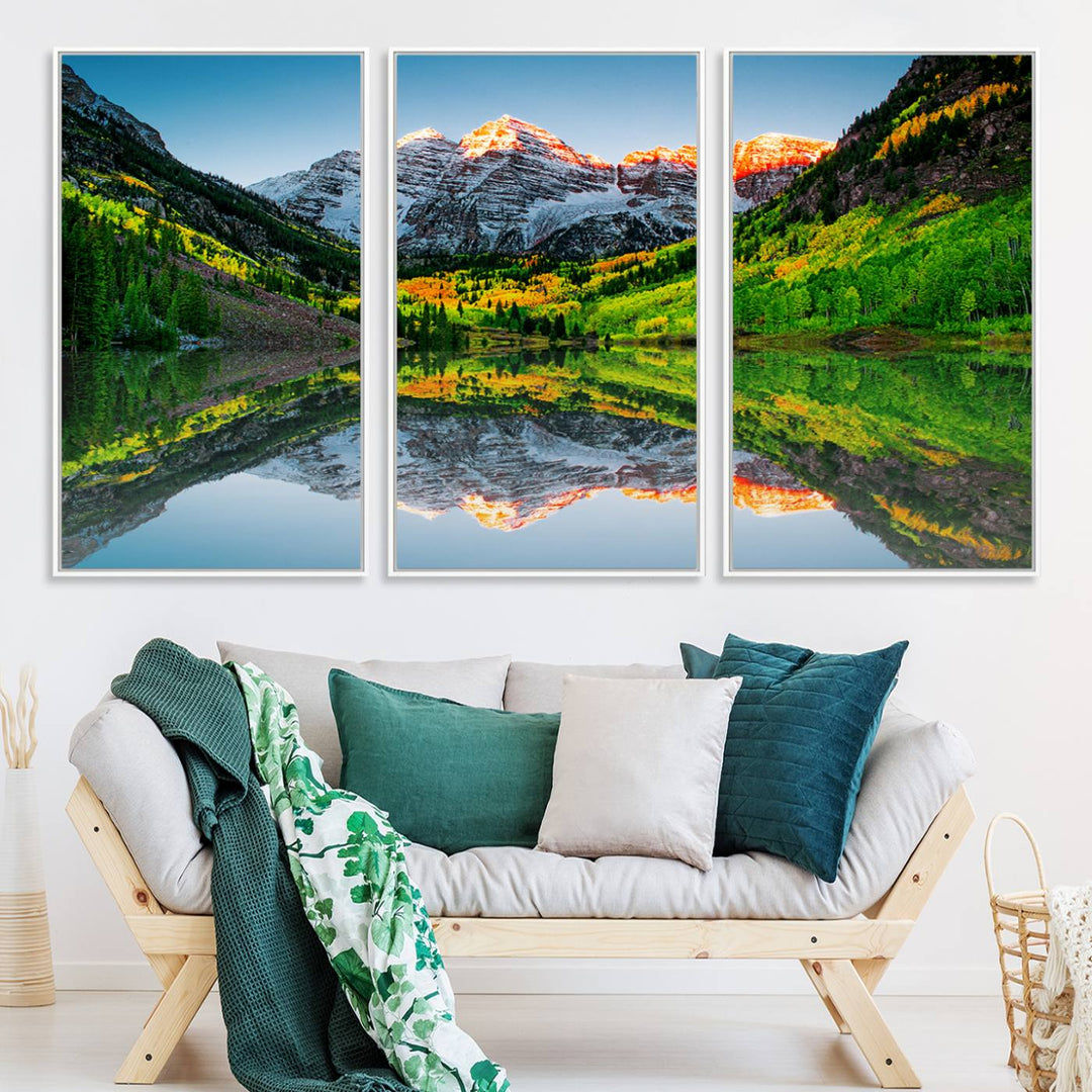 The Sunrise Maroon Bells Lake Wall Art Print beautifully captures North Maroon Peak mirrored in the tranquil lake, framed by lush greenery.