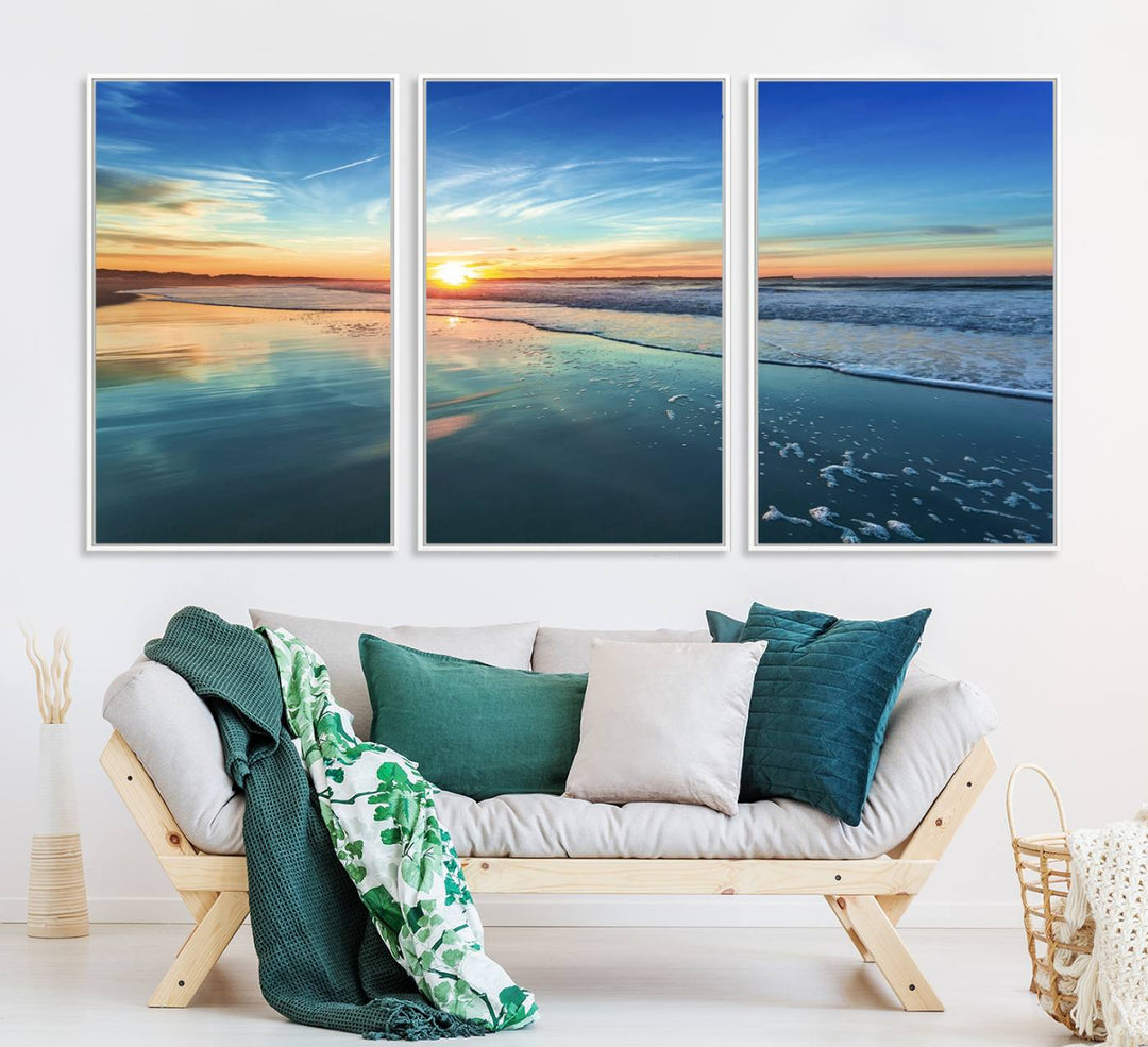 The Blue Sky and Beach Wall Art Canvas Print features a vibrant orange sky reflecting on wet sand.