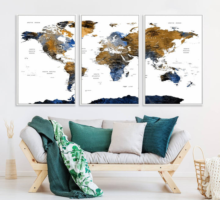 The Triptych Modern World Map Canvas in blue and brown is an ideal global decor piece for enhancing living rooms or offices. It comes ready to hang.