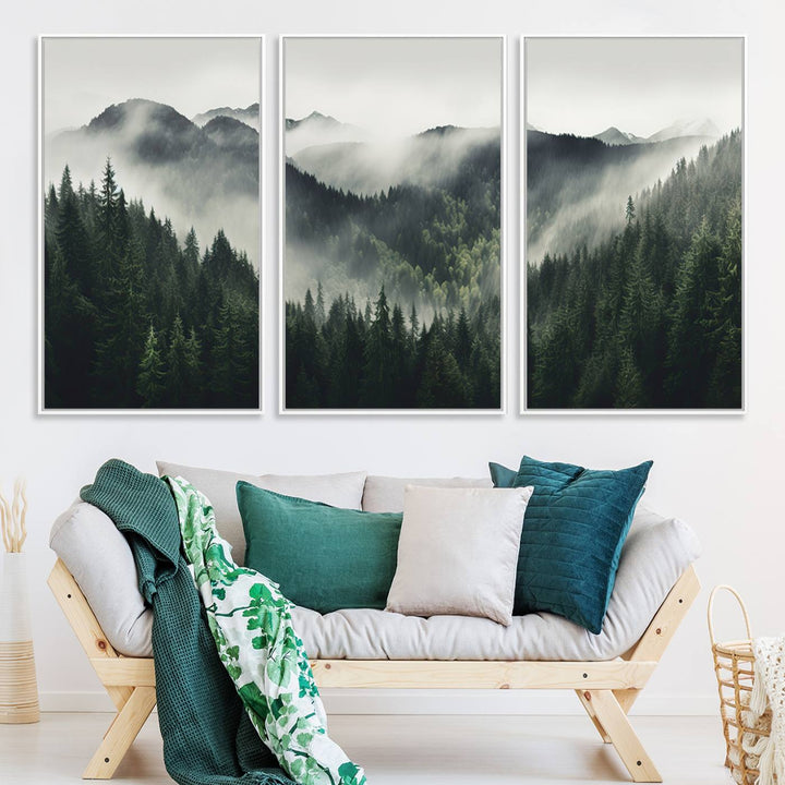 The Misty Forest Canvas Print Wall Art captures a serene misty forest scene with fog and mountains.