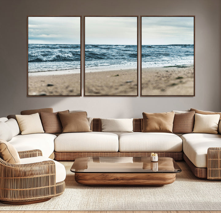 A moody ocean scene with gentle waves washing onto a sandy beach under a cloudy sky, creating a peaceful and coastal atmosphere.