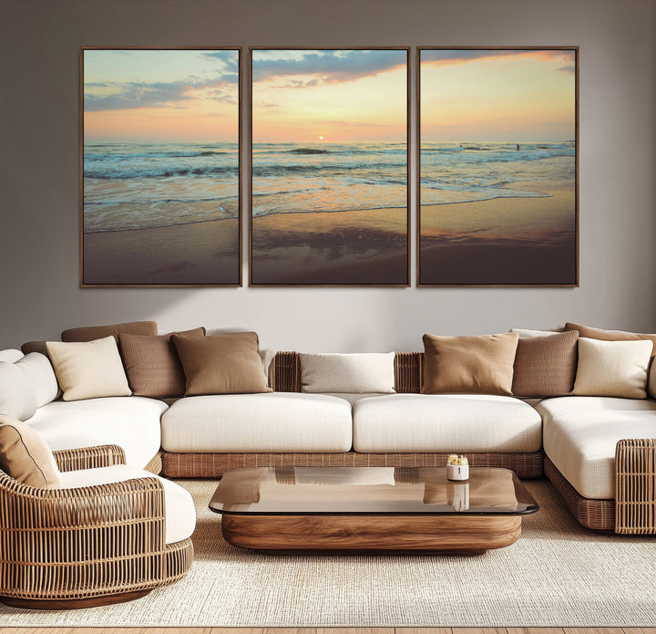 Warm sunset over gentle ocean waves with pastel sky and reflections on wet sand, creating a calm and soothing beach ambiance.