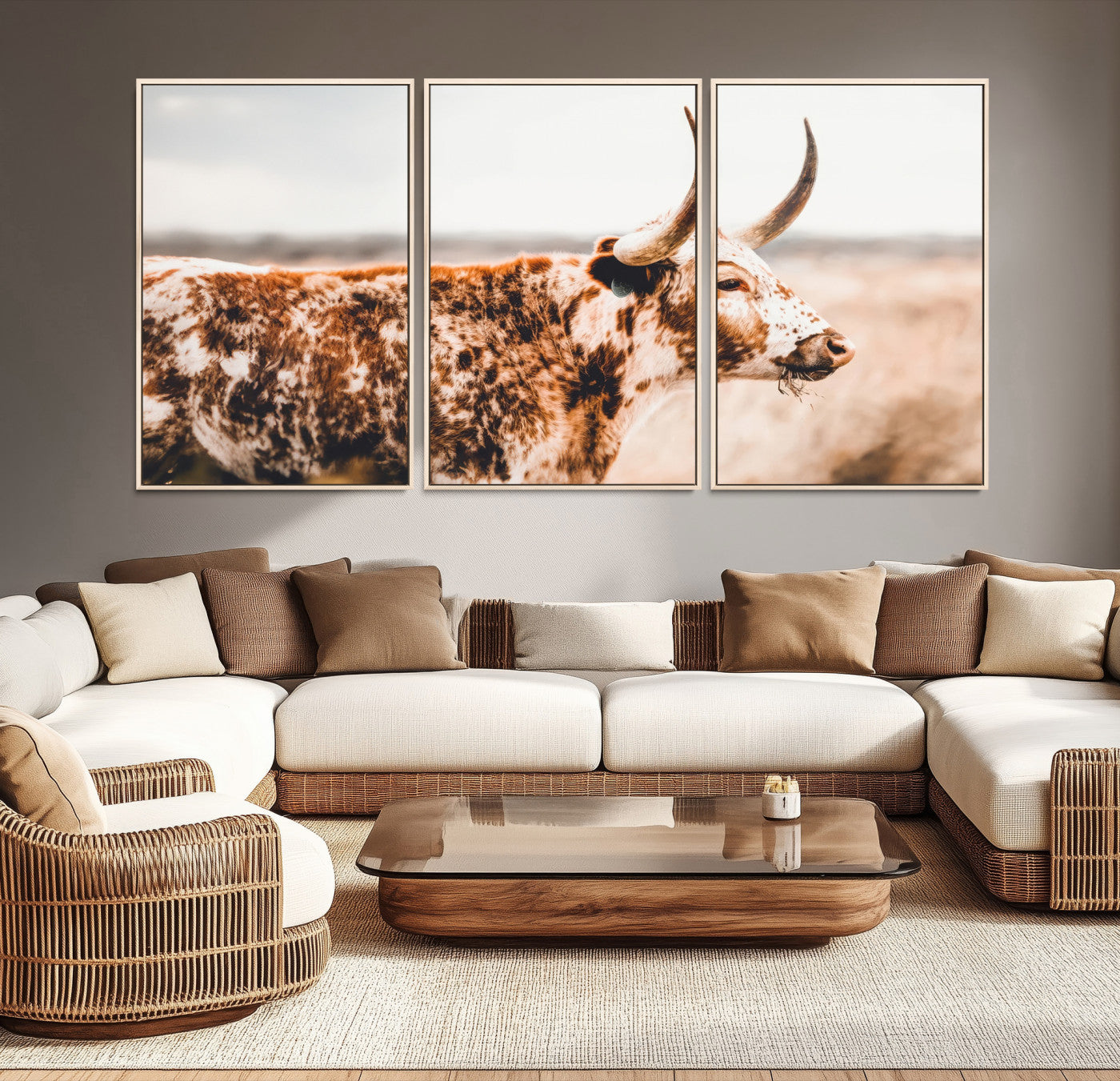 Speckled Texas longhorn with curved horns standing in a warm-toned prairie, perfect for rustic or country-style home decor.
