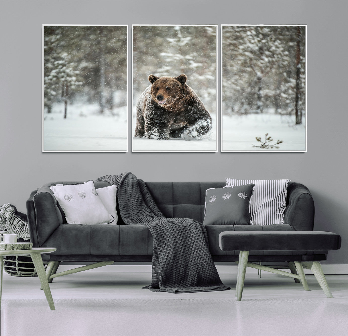 A majestic brown bear moves through a snowy forest landscape, surrounded by falling snowflakes, capturing the essence of wildlife in winter.