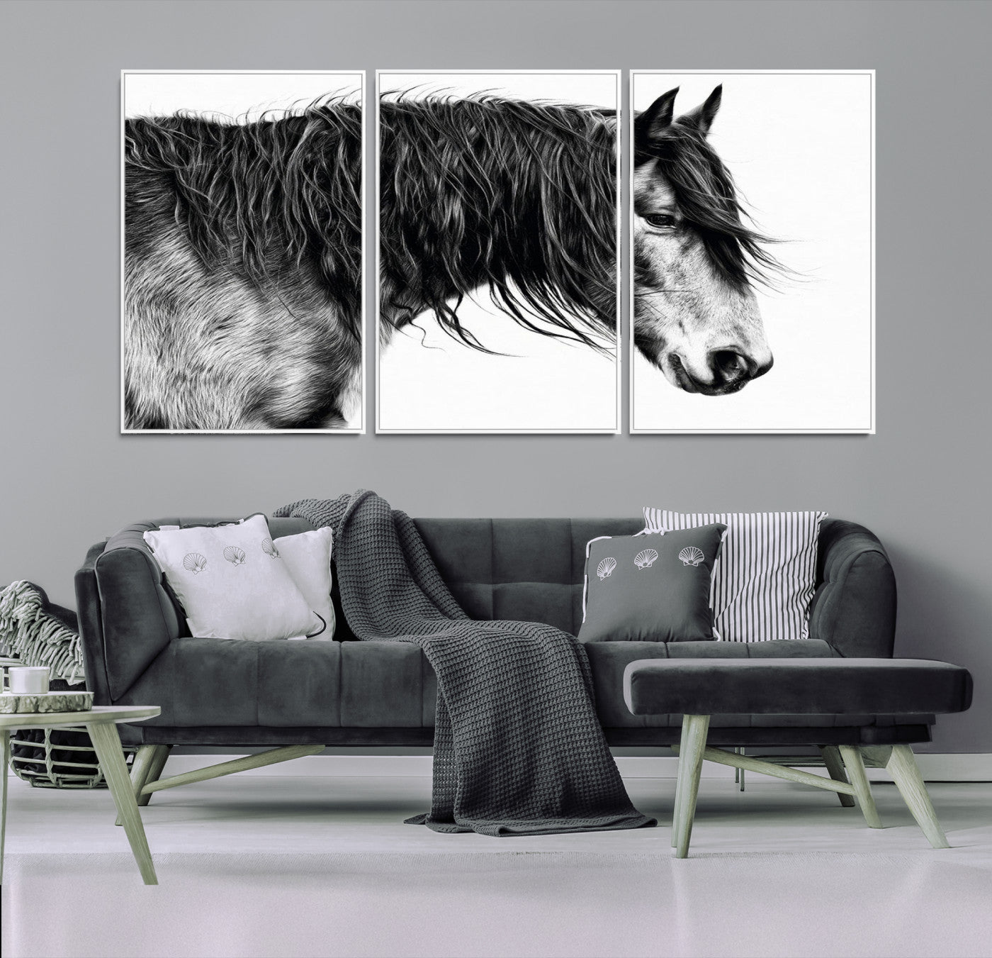 A stunning black-and-white portrait of a horse with a flowing mane, captured in dramatic detail and emotion.