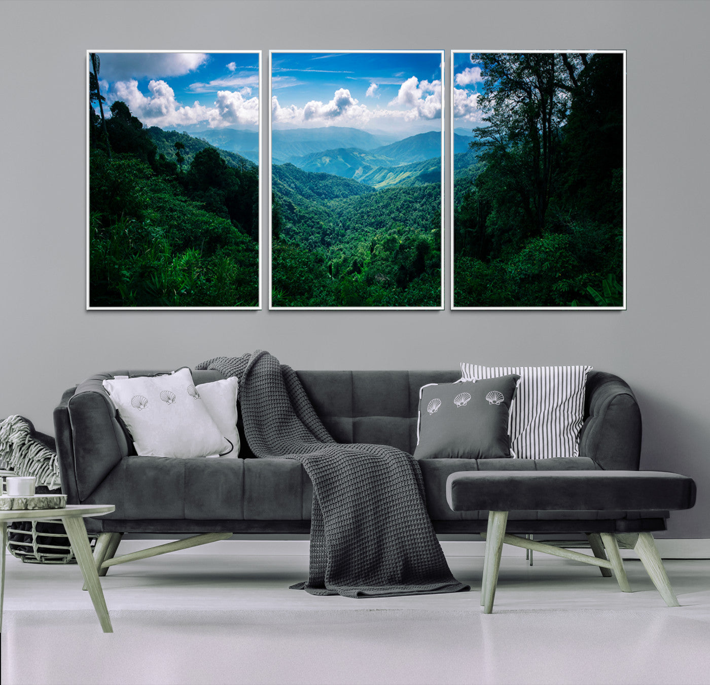 Canvas of a misty tropical jungle with vibrant greenery and layered blue mountains, ideal for exotic nature-themed wall décor.
