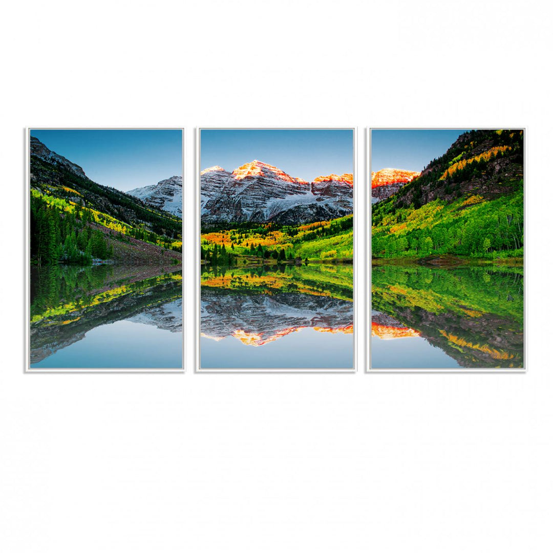 The Sunrise Maroon Bells Lake Wall Art Print beautifully captures North Maroon Peak mirrored in the tranquil lake, framed by lush greenery.