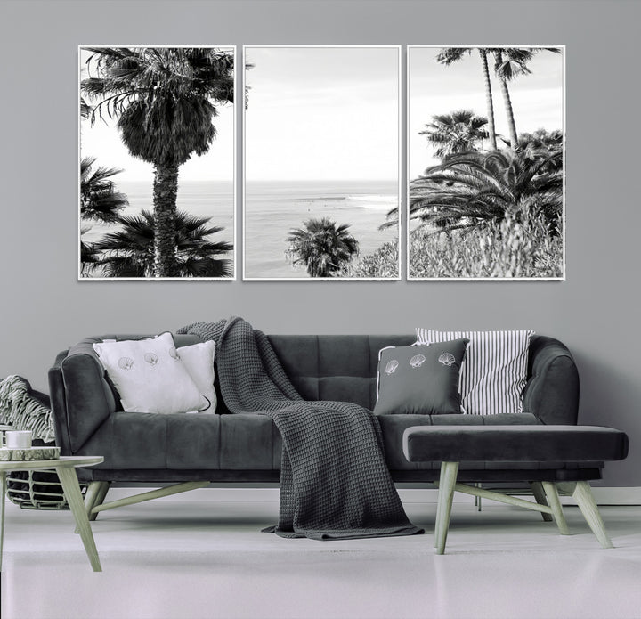Monochrome canvas of palm trees framing a coastal surf scene, perfect for California-inspired or retro black-and-white beach decor.