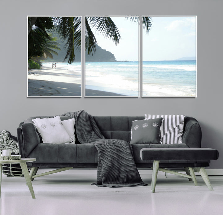 Tropical beach with palm tree shadows, white sand, and turquoise ocean waves, creating a serene and relaxing island escape atmosphere.