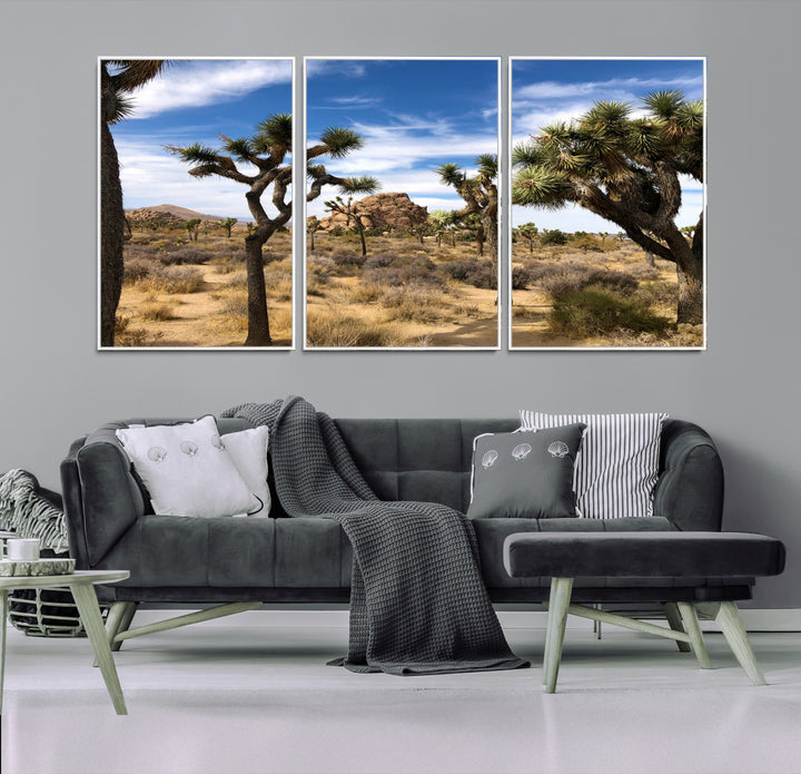 Scenic Joshua Tree landscape with rugged desert terrain, golden dry grass, and a deep blue sky, creating a warm, rustic Southwestern aesthetic.