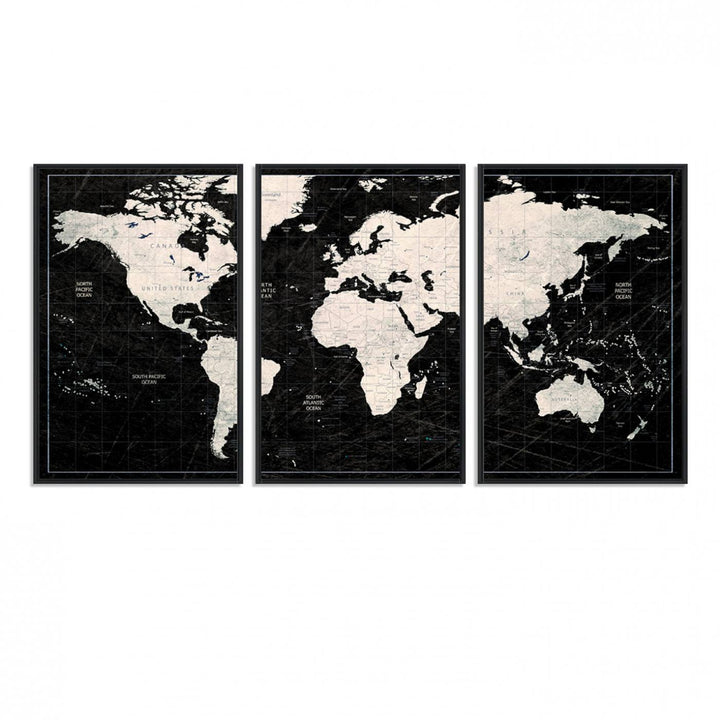 A bold global style framed black and white world map canvas print, presented in three panels, perfect for modern home or office decor.