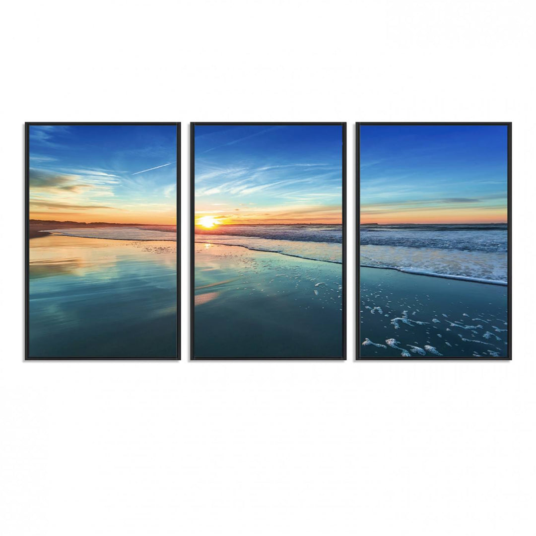 The Blue Sky and Beach Wall Art Canvas Print features a vibrant orange sky reflecting on wet sand.