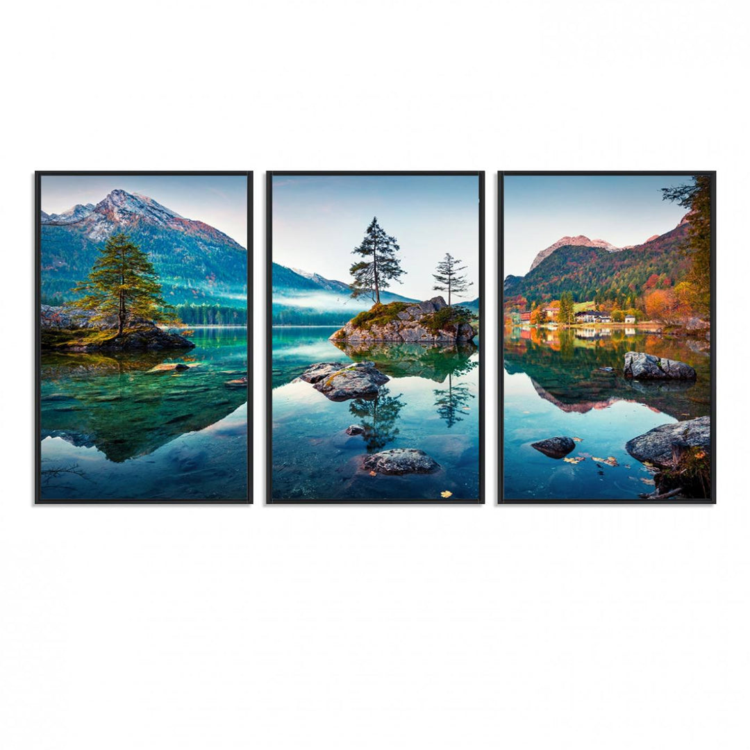 The 3-panel wall art showcases a serene mountain lake with rocky islands and trees, creating an ideal focal point for dining rooms or offices.