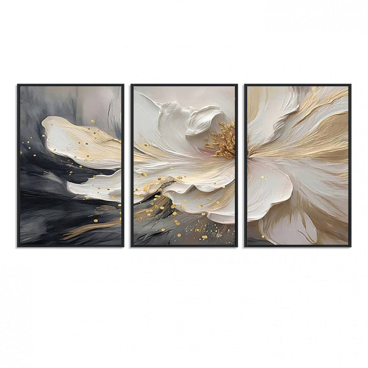 Elegant White and Gold Floral Triptych Canvas Art, a modern textured flower painting for home or office decor, features a blurred gray background.