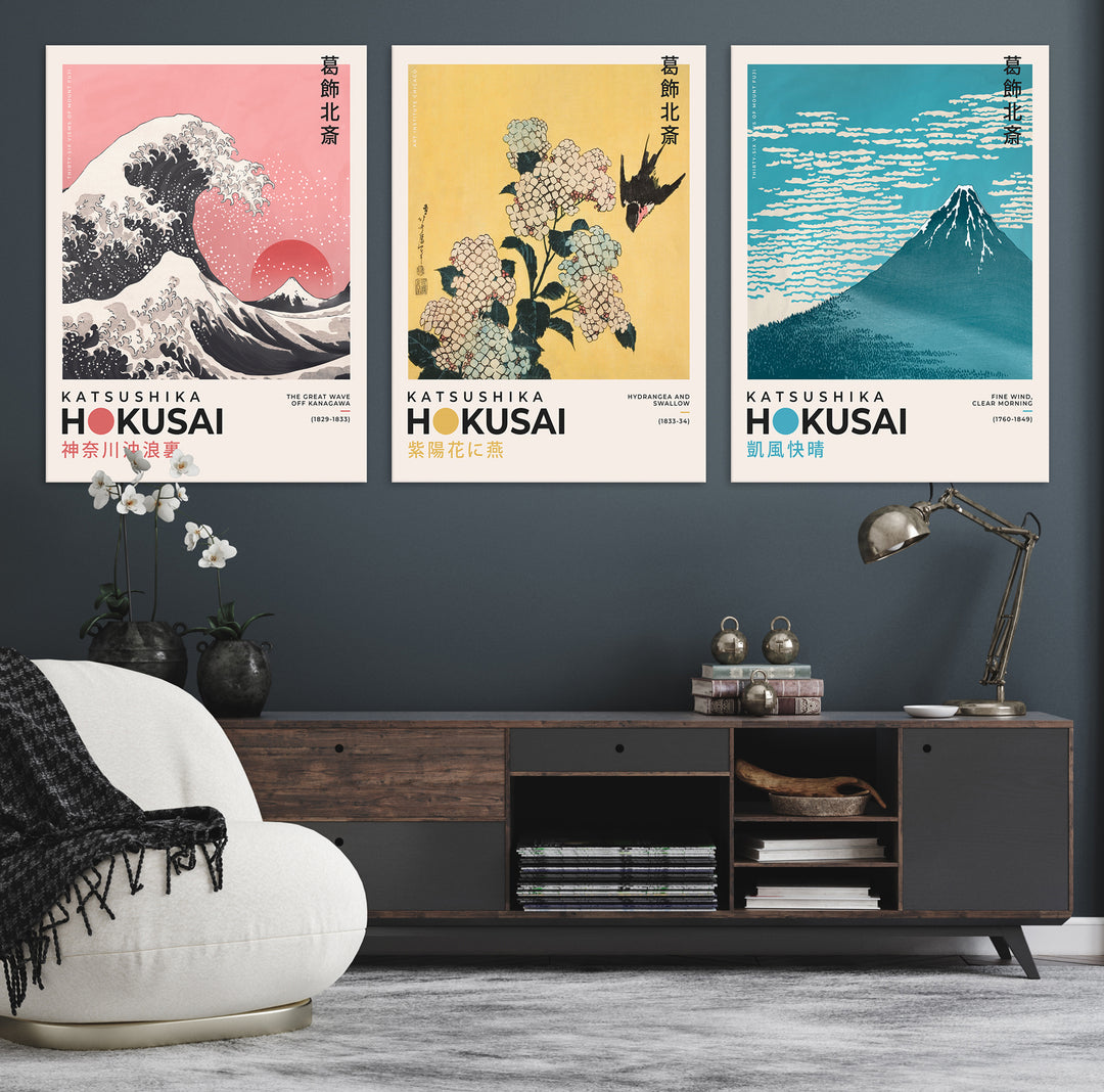 The room showcases the vibrant Katsushika Hokusai Japanese Art Print Canvas Print Set—consisting of The Great Wave, Hydrangea & Swallow, and Mount Fuji vintage wall art—highlighting the beauty of traditional Japanese art.