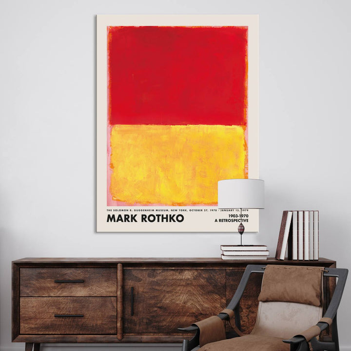 A Mark Rothko canvas wall art print, showcasing iconic abstract expressionist design in red and yellow, graces the wall, adding vibrancy to the minimalist interior.