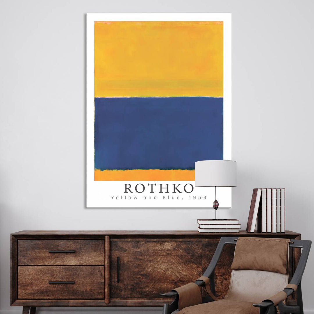 A minimalist room features a Mark Rothko Canvas Wall Art Print, showcasing abstract expressionism with its bold colors.