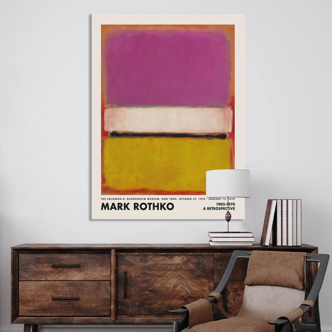 A modern and minimalist living room features a Mark Rothko Canvas Wall Art Print with bold colors, embracing abstract expressionism.