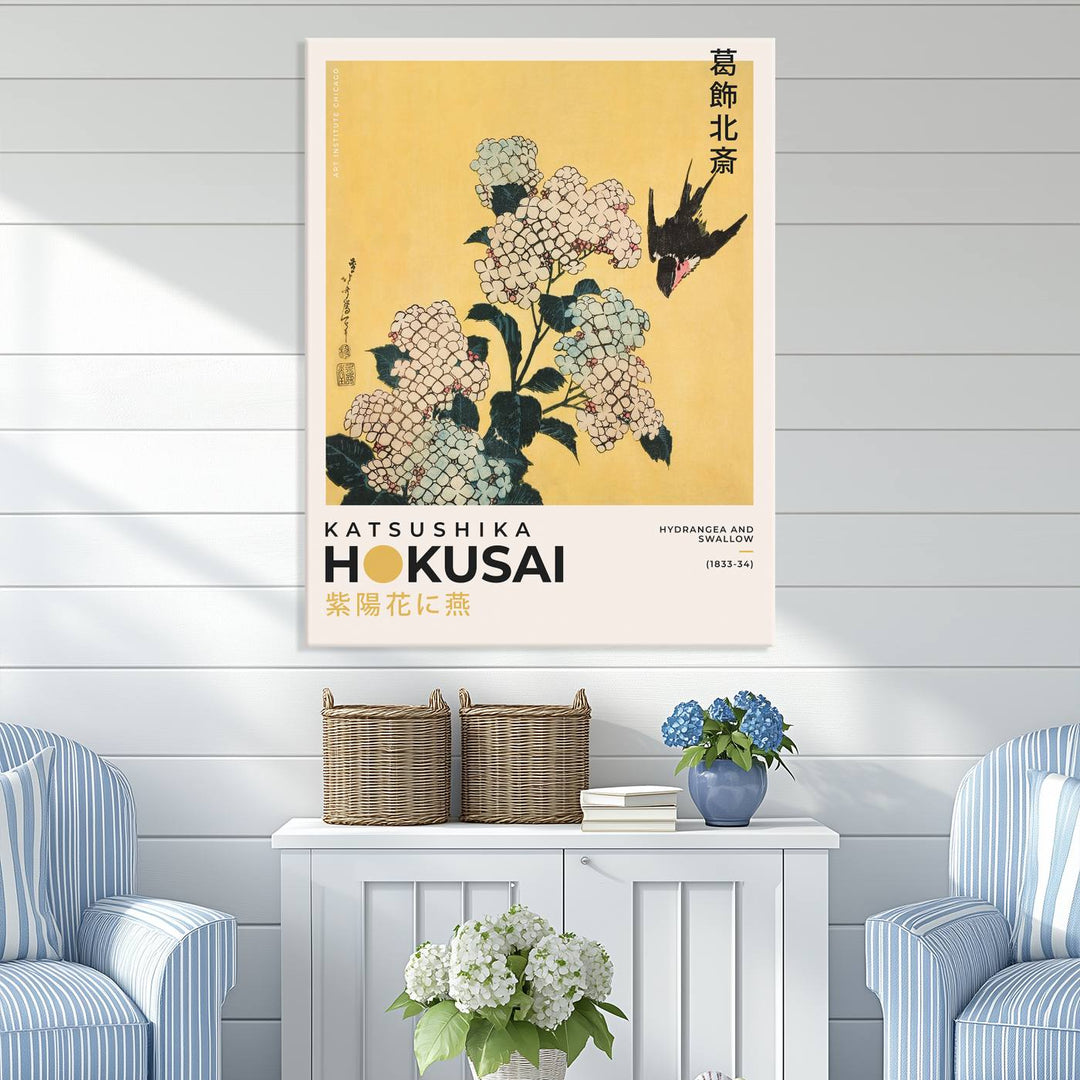 The Katsushika Hokusai Hydrangea and Swallow Canvas Wall Art Print highlights elegant Japanese floral art with a swallow, beautifully displayed against a textured wall. Ideal for adding charm to your living room, bedroom, or office.