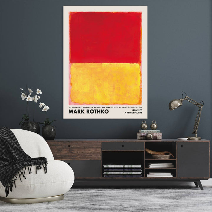 A Mark Rothko canvas wall art print, showcasing iconic abstract expressionist design in red and yellow, graces the wall, adding vibrancy to the minimalist interior.