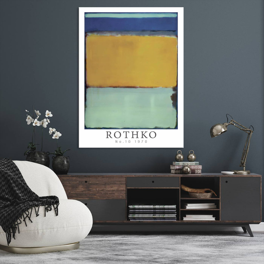 The living room features a Mark Rothko Set of Canvas Wall Art Print, which adds a touch of abstract expressionism and seamlessly blends into the serene ambiance.