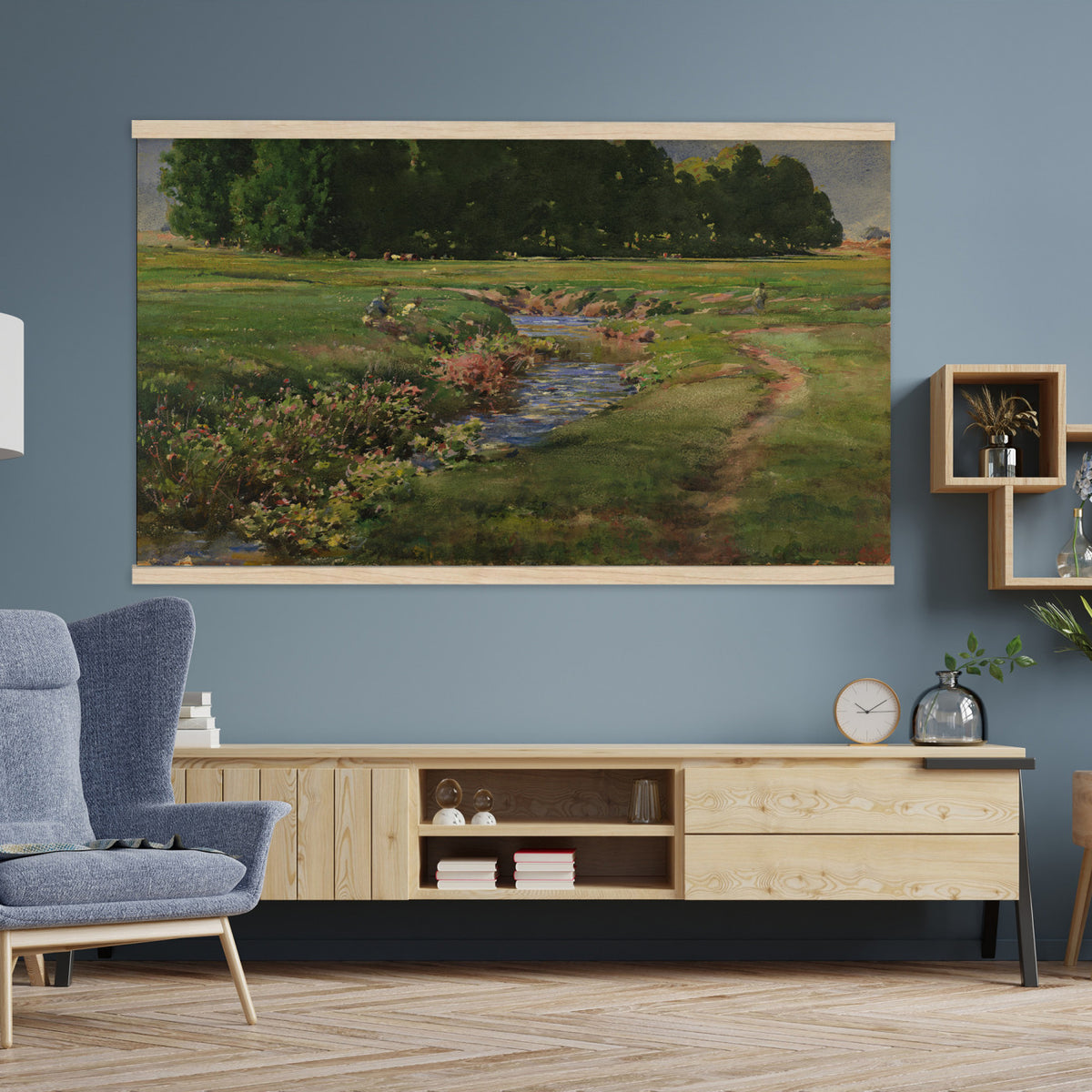 28805531-MGV-TP-30X20 - Tonalism watercolor tapestry wall hanging of "The Babbling Brook" by William Henry Holmes, showing a small brook running through open meadow grass, with soft banks, low shrubs, and a gentle rise beyond in fresh meadow greens with pale blue water and a soft light sky. Extra large wall art, made in the USA.