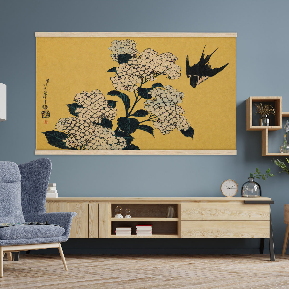 24787197-MGV-TP-30X20 - Ukiyo-e woodblock print tapestry wall hanging of "Hydrangea and Swallow" by Katsushika Hokusai, showing a swallow in flight above a full hydrangea head, drawn with the precise line of Japanese woodblock in soft blue hydrangea blooms with warm gold ground. Extra large wall art, made in the USA.