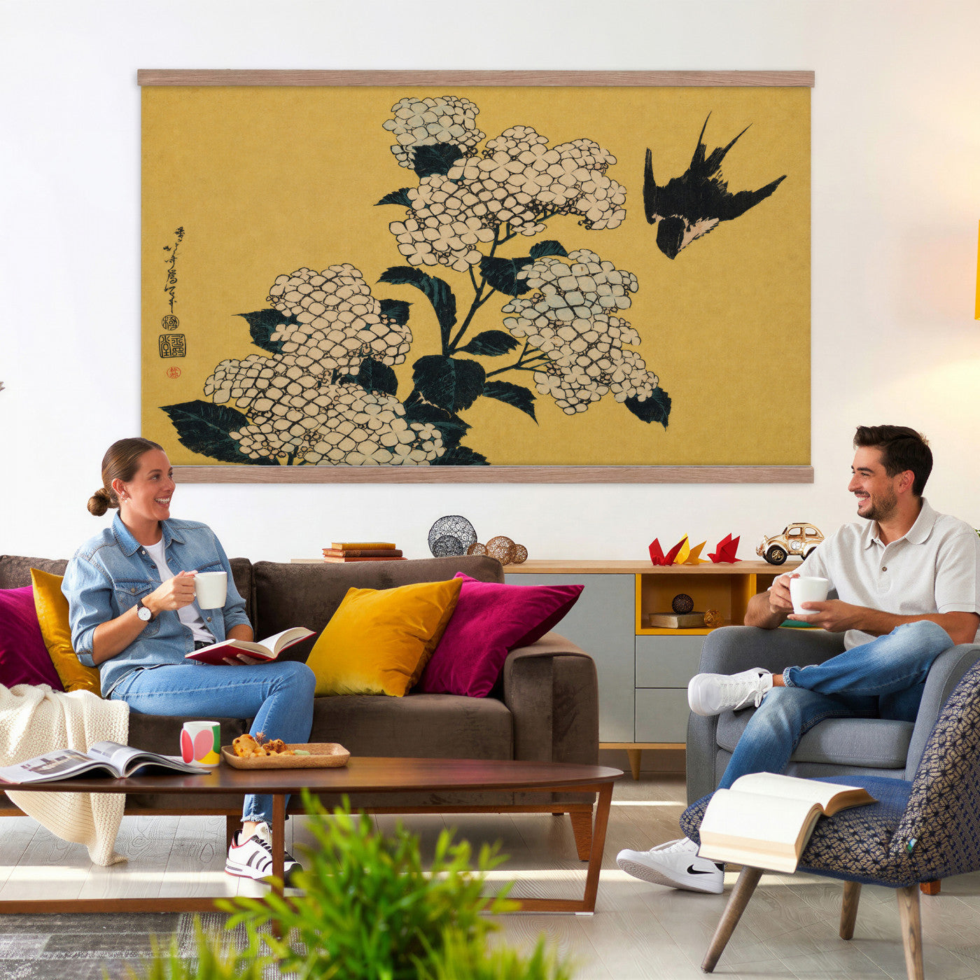 24787197-MGV-TP-30X20 - Ukiyo-e woodblock print tapestry wall hanging of "Hydrangea and Swallow" by Katsushika Hokusai, showing a swallow in flight above a full hydrangea head, drawn with the precise line of Japanese woodblock in soft blue hydrangea blooms with warm gold ground. Extra large wall art, made in the USA.