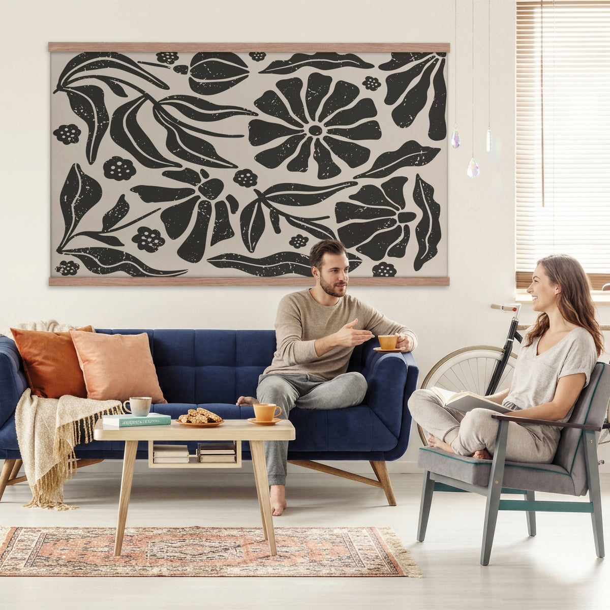 21342917-MGV-TP-30X20 - Mid Century Modern linocut print tapestry wall hanging of "Abstract Floral Linocut", showing simplified flower heads and stems cut into bold black shapes against clean white space in bold black shapes on a bright white ground. Extra large wall art, made in the USA.