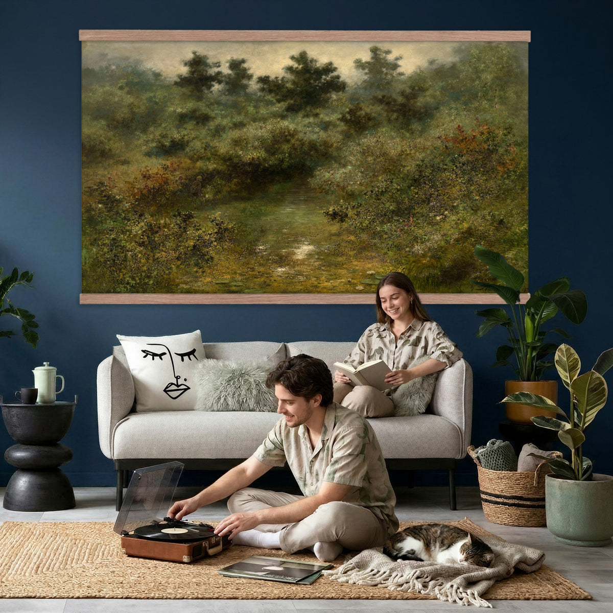 66880646-MGV-TP-30X20 - Barbizon oil painting tapestry wall hanging of "By the Brook" by Xavier De Cock, showing a shaded brook winding through dense woodland, with a small hidden figure resting among the trees in dark layered forest greens with warm brown earth and pale water light. Extra large wall art, made in the USA.