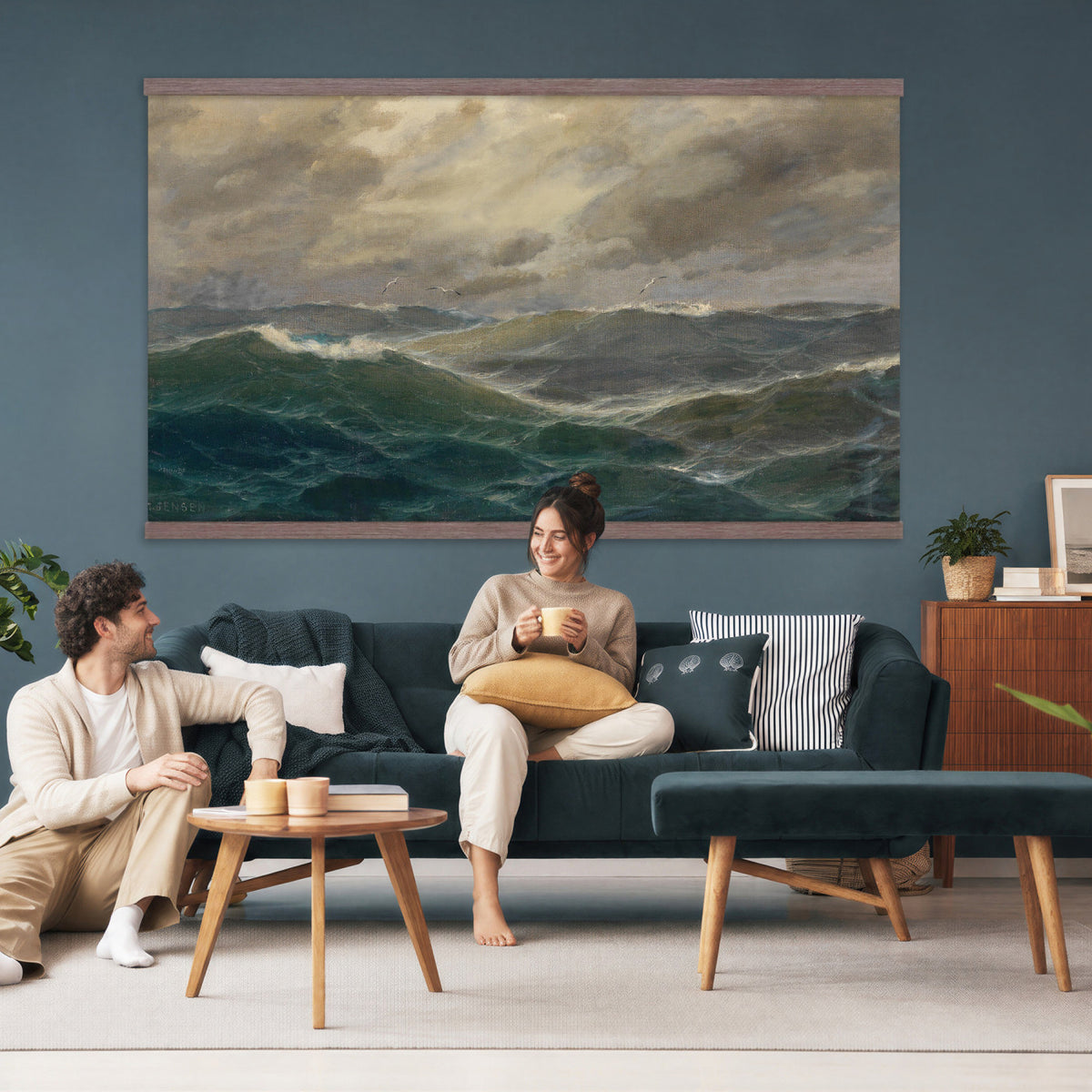 93539190-MGV-TP-30X20 - Realism oil painting tapestry wall hanging of "Stormy Sea" by Alfred Jensen, showing heavy breaking waves rolling under a dark storm sky, with white foam catching the last light on the water in deep grey-green waves with white foam under a heavy storm sky. Extra large wall art, made in the USA.