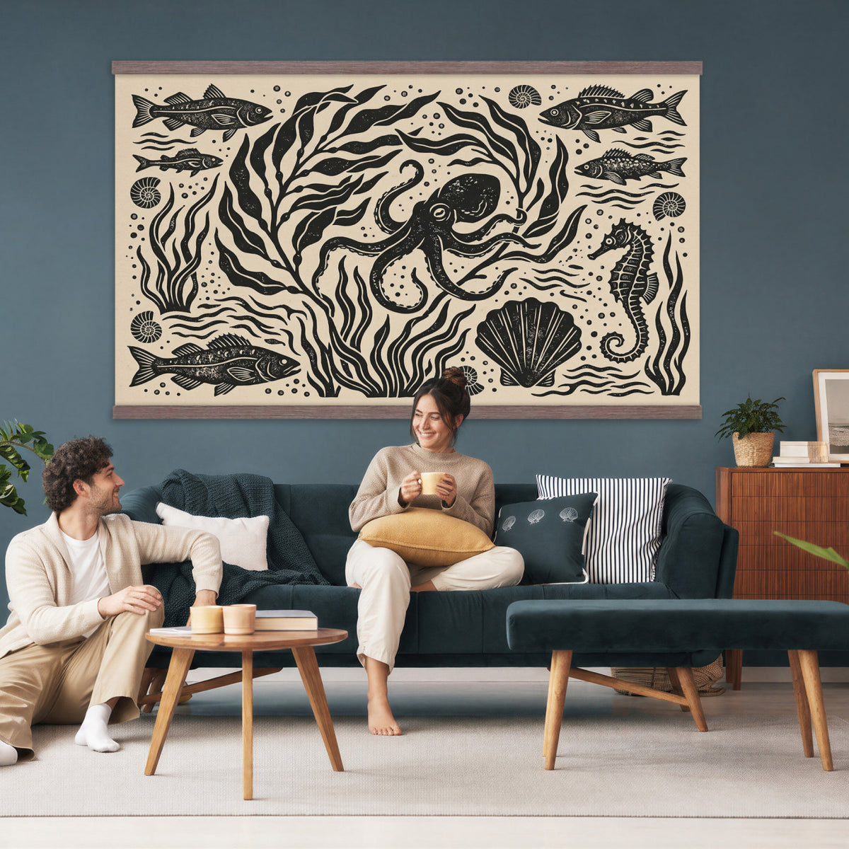 75988079-MGV-TP-30X20 - Folk Art linocut print tapestry wall hanging of "Ocean Life Panel", showing an octopus, seahorses, shells and curling waves cut into bold black and white folk art shapes in bold black linocut shapes on a cream ground. Extra large wall art, made in the USA.