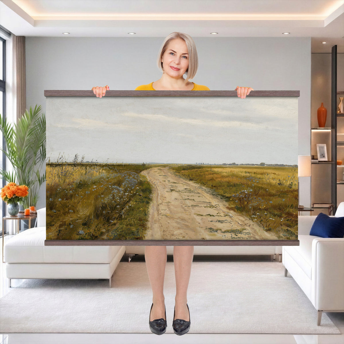 93198256-MGV-TP-30X20 - Realism oil painting tapestry wall hanging of "Field Track" by Jozef Chelmonski, showing a rutted dirt track cutting through open meadow grass toward a low horizon and a wide country sky in warm earth track tones with green meadow grass under a broad sky. Extra large wall art, made in the USA.