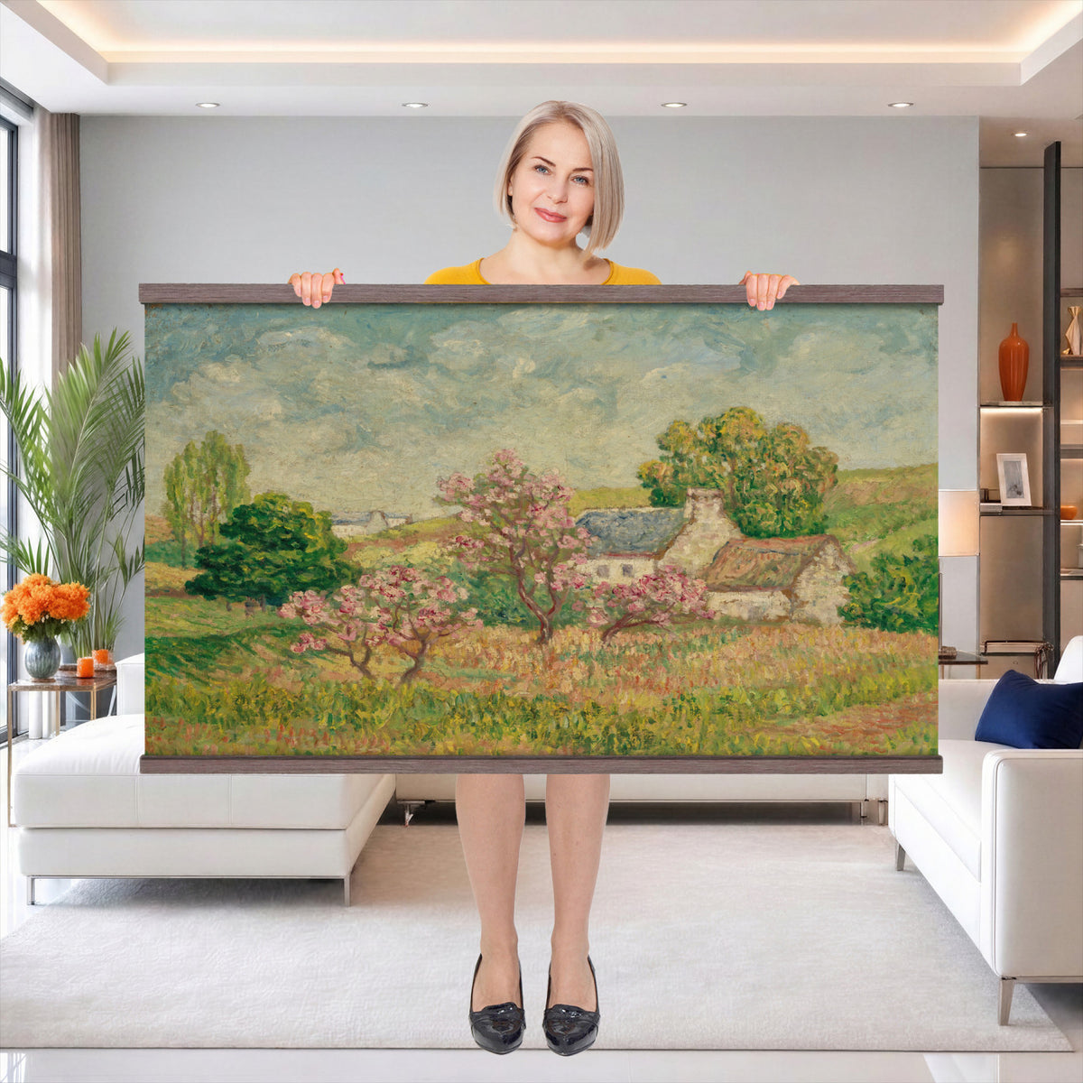 67494912-MGV-TP-30X20 - Post Impressionism oil painting tapestry wall hanging of "Spring" by Ernest de Chamaillard, showing a stone Breton cottage behind a blossoming tree in full pink bloom, with a bright spring garden around it in soft pink blossoms against grey stone walls and new spring green. Extra large wall art, made in the USA.