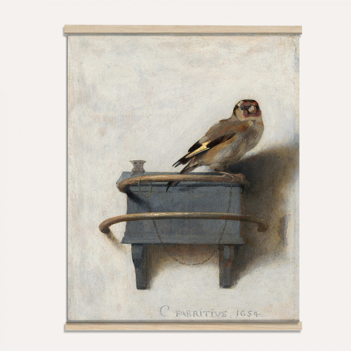 88453247-MGV-TP-24X36 - Dutch Golden Age oil painting tapestry wall hanging of "The Goldfinch" by Carel Fabritius, showing a small goldfinch chained to its feeder box, painted against a pale sunlit wall in famous trompe l'oeil detail in warm gold and black bird plumage against a pale cream sunlit wall. Extra large wall art, made in the USA.