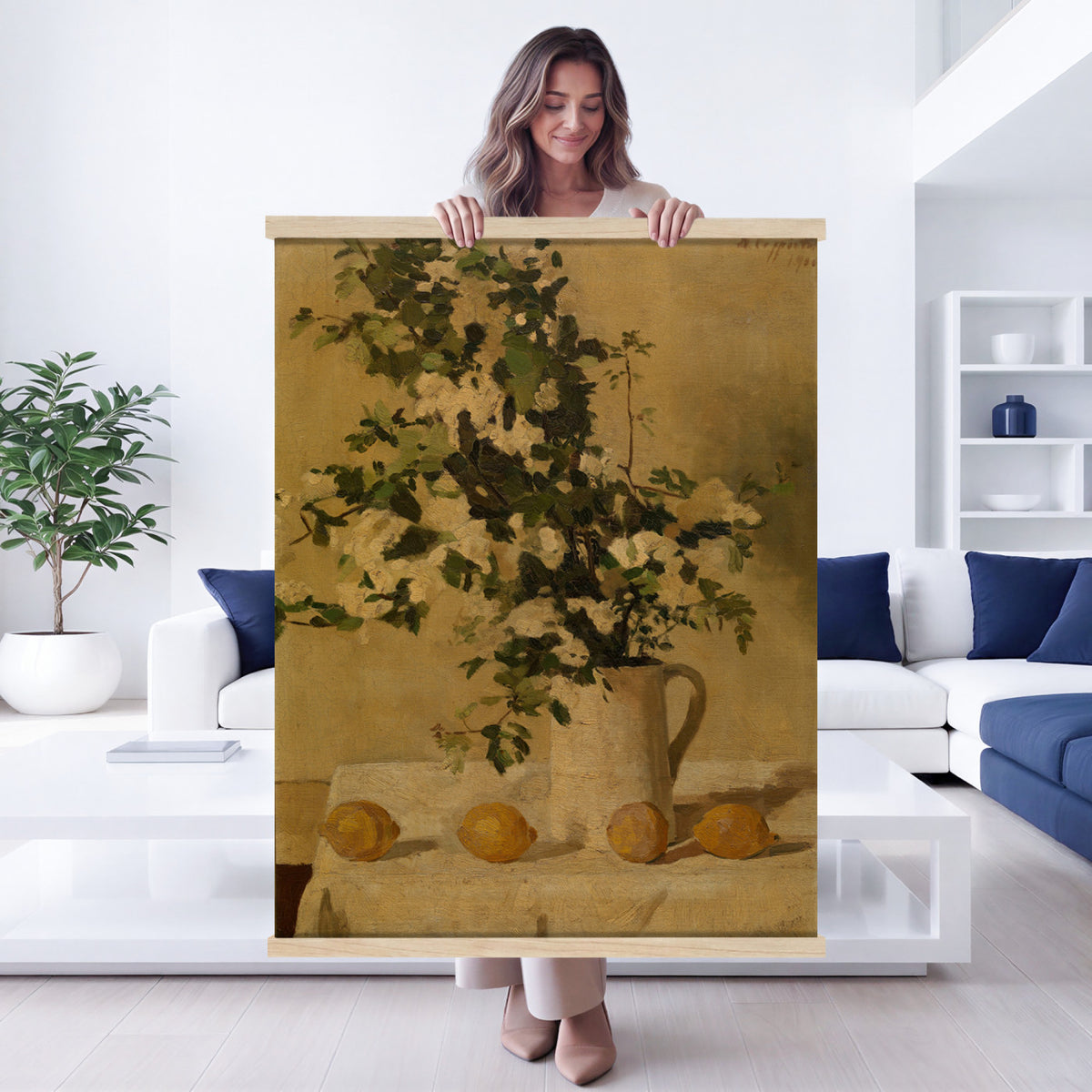 64966890-MGV-TP-24X36 - Still Life oil painting tapestry wall hanging of "Lemons and White Flowers", showing bright lemons beside a vase of white blooms on a plain table, lit softly from one side in warm yellow lemons and white petals against a soft neutral ground. Extra large wall art, made in the USA.