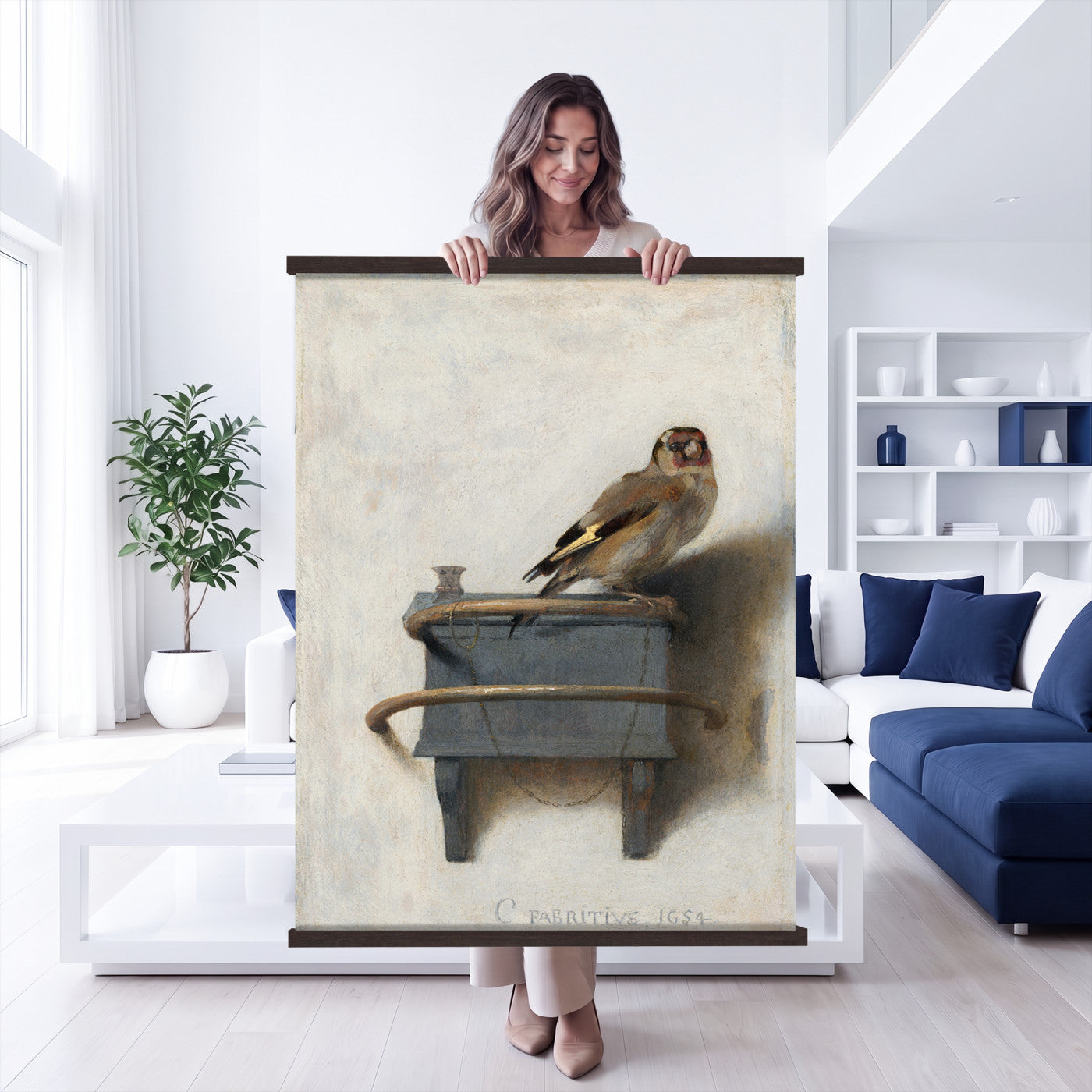 88453247-MGV-TP-24X36 - Dutch Golden Age oil painting tapestry wall hanging of "The Goldfinch" by Carel Fabritius, showing a small goldfinch chained to its feeder box, painted against a pale sunlit wall in famous trompe l'oeil detail in warm gold and black bird plumage against a pale cream sunlit wall. Extra large wall art, made in the USA.