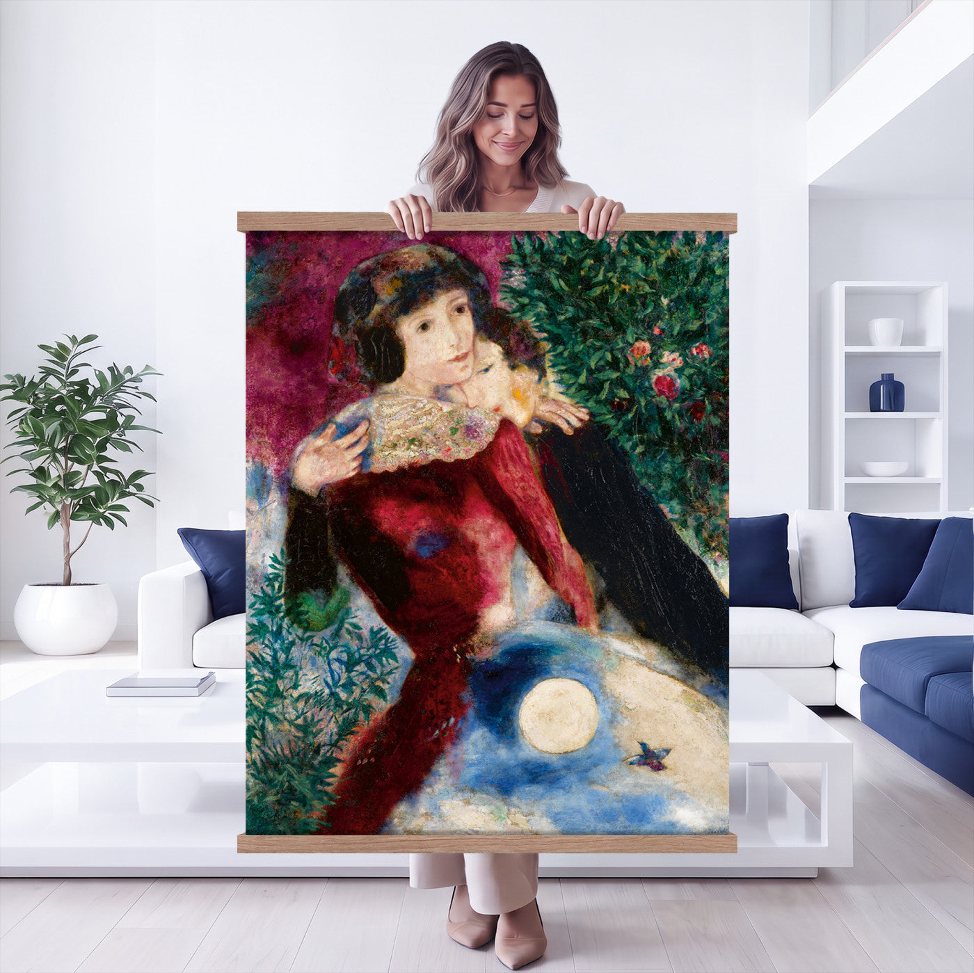 67037419-MGV-TP-24X36 - Surrealism oil painting tapestry wall hanging of "Bella with a White Collar" by Marc Chagall, showing a towering figure in a white collar above a small embracing couple, set under a soft moonlit sky in deep green foliage and soft blue sky with a pale white collar. Extra large wall art, made in the USA.
