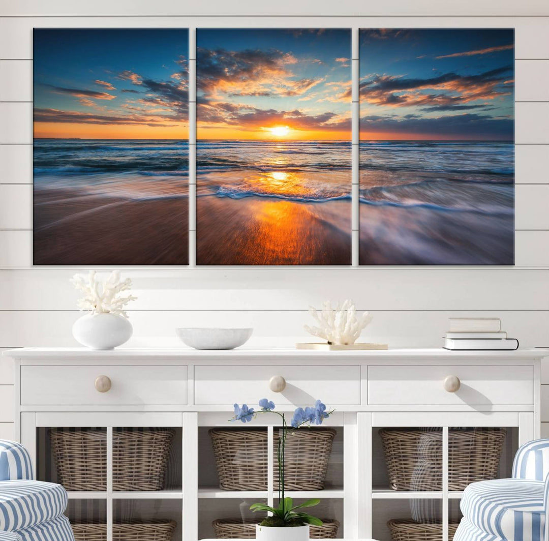 The Sunset on the Ocean canvas adds coastal ambiance to the wooden wall.